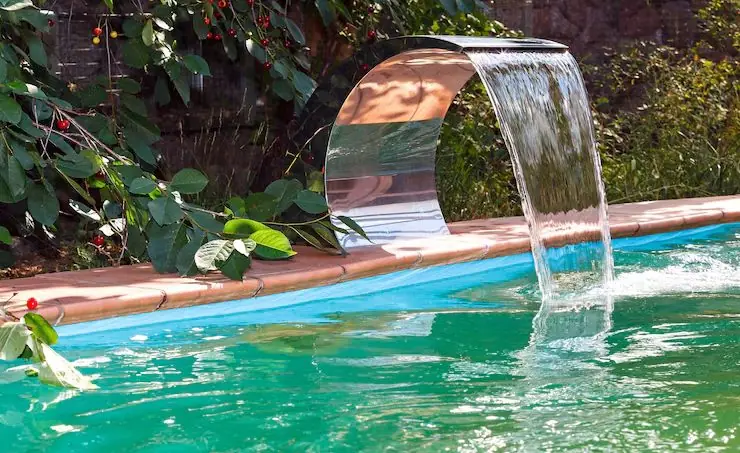 Custom pool water feature by Heavenly Outdoor in Spring, Texas